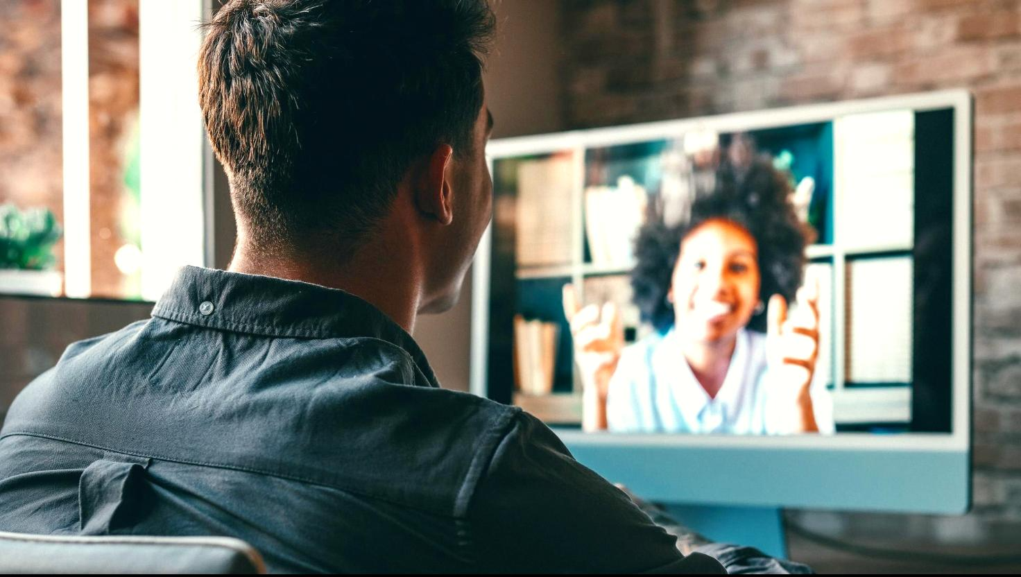 An organization's business phone upgrades allowing office and remote work employees to video conference easily.